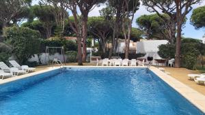 The swimming pool at or close to LUXURY STYLE VILLA AURORA Roche