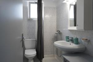 Ванная комната в Amvrosia Apartments