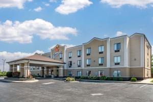 a rendering of a hotel with a parking lot at Comfort Inn Airport in Plainfield