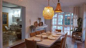 A seating area at LUXURY STYLE VILLA AURORA Roche