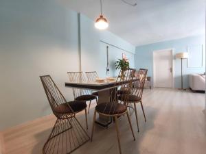 a dining room with a table and chairs at Stylish Spacious 3B Flat in Ortaköy near Bosphorus in Istanbul