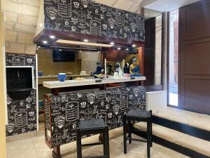 A kitchen or kitchenette at Solo Vip