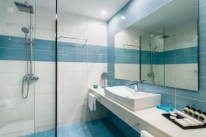 Kúpeľňa v ubytovaní Lagaria Hotel