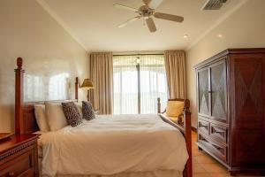 Voodi või voodid majutusasutuse Bougainvillea 8211 Luxury Apartment - Reserva Conchal toas