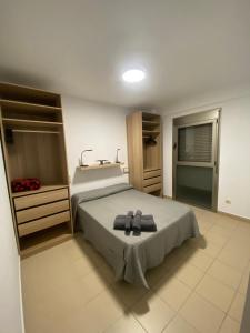 Ένα ή περισσότερα κρεβάτια σε δωμάτιο στο Caballos fufos de tazacorte