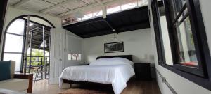 Voodi või voodid majutusasutuse INLOFT Quindío toas