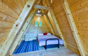 Tempat tidur dalam kamar di Rural Holiday Home "Rim" Ruralna kuća za odmor