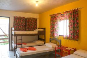 Una cama o camas cuchetas en una habitación  de KM Hostel