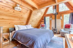 Postel nebo postele na pokoji v ubytování Chalet Shangri-La