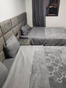 Posteľ alebo postele v izbe v ubytovaní Hôtel Assaâda
