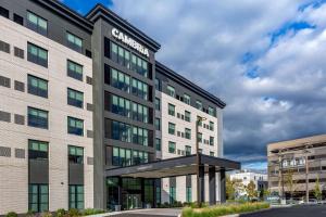 a rendering of the courtyard hotel in a city at Cambria Hotel New Haven University Area in New Haven