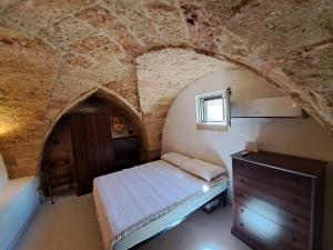 Postel nebo postele na pokoji v ubytování Corte Giuggiola