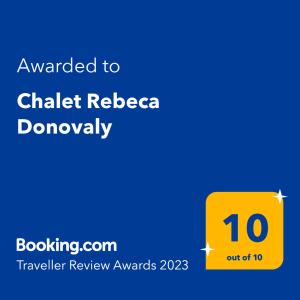 Ett certifikat, pris eller annat dokument som visas upp på Chalet Rebeca Donovaly