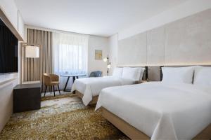 Cama ou camas em um quarto em The Westin Grand Frankfurt