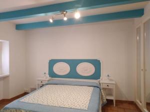 เตียงในห้องที่ CASAMIASIROLO - Casa nei vicoli di Sirolo