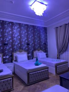 Voodi või voodid majutusasutuse Lucky Hostel toas