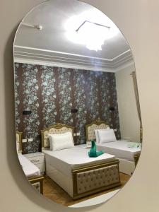 Voodi või voodid majutusasutuse Lucky Hostel toas