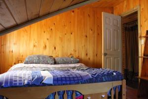 Postel nebo postele na pokoji v ubytování Valle el Abra Ralún Lodge