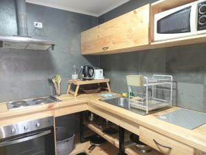 Dapur atau dapur kecil di Natagonia Apartments