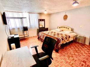 Postel nebo postele na pokoji v ubytování B&B México Roma Norte