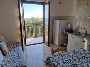 A kitchen or kitchenette at Via Pasquale Testa Még 37 kép