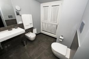Koupelna v ubytování Capital Suite