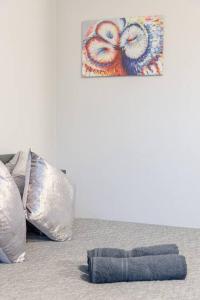 a pair of jeans and a bag on the floor at 1 Private Double Room in Berala near Station close to Olympic Park in Regents Park