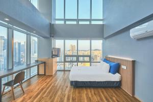 Postel nebo postele na pokoji v ubytování Kolon Seacloud Hotel + 37 fotografií