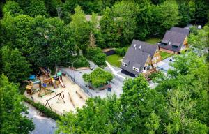 an aerial view of a house with a park at Chalet Tournesol Durbuy in Durbuy