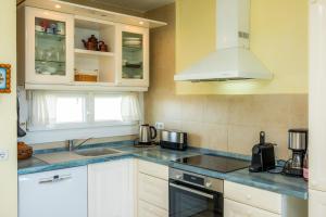 Kuchyň nebo kuchyňský kout v ubytování Top Strandwohnung Marina Park