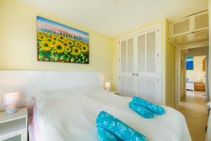 Postel nebo postele na pokoji v ubytování Top Strandwohnung Marina Park