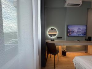 TV a/nebo společenská místnost v ubytování FUHOTEL