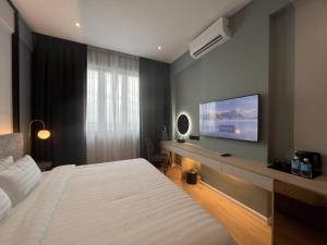 Postel nebo postele na pokoji v ubytování FUHOTEL