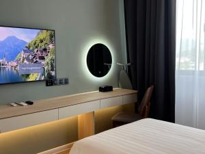 Postel nebo postele na pokoji v ubytování FUHOTEL