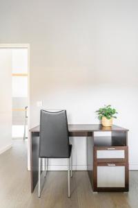 Posezení v ubytování Grande chambre privée avec salle de bain et WC