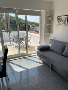 Posezení v ubytování Apartment in Povlja with sea view, terrace, air conditioning, WiFi 3419-2