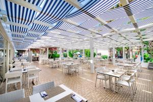 Restaurace v ubytování Utopia Resort & Residence