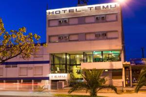 a hotel temillin building with a hotel temillin at Hotel Temu in Villa Carlos Paz