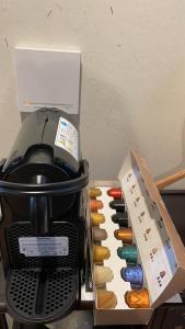a coffee maker with a box on top of it at Kyoto-Toji house in Kyoto +30 photos