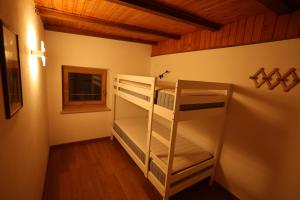 Postel nebo postele na pokoji v ubytování Casa Latemar