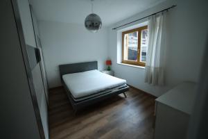 Postel nebo postele na pokoji v ubytování Casa Latemar