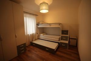 Postel nebo postele na pokoji v ubytování Casa Latemar