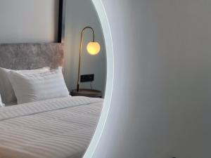 Postel nebo postele na pokoji v ubytování FUHOTEL