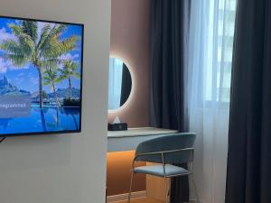 TV a/nebo společenská místnost v ubytování FUHOTEL