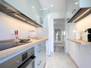 Kuchyňa alebo kuchynka v ubytovaní QUINTA SANT POL Apto 6 pax a 50 metros mar E29047