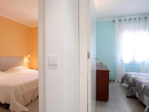 Posteľ alebo postele v izbe v ubytovaní QUINTA SANT POL Apto 6 pax a 50 metros mar E29047