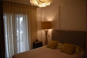 A bed or beds in a room at Villa Musa with private pool