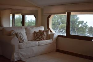 A seating area at Villa Musa with private pool