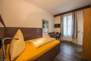 Krevet ili kreveti u jedinici u okviru objekta Hotel Scheffelhof