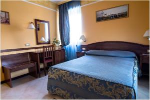 Postel nebo postele na pokoji v ubytování B&B Degli Amici